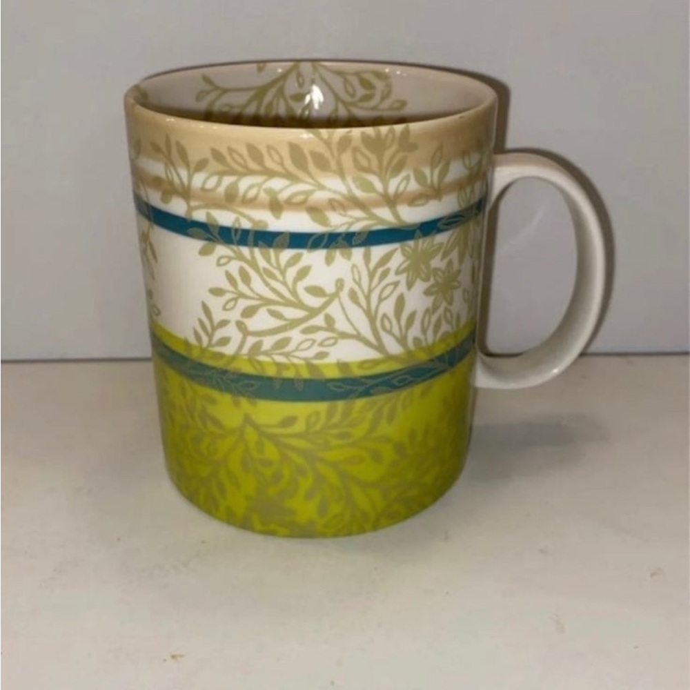 Green Starbucks coffee mug. 14 fl oz/414 mL
